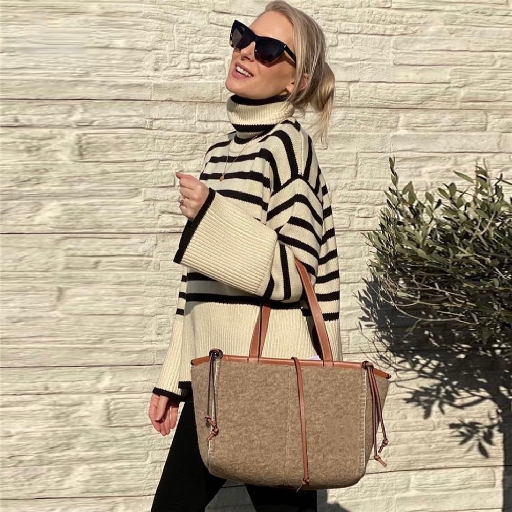 Nala suéter de cuello alto